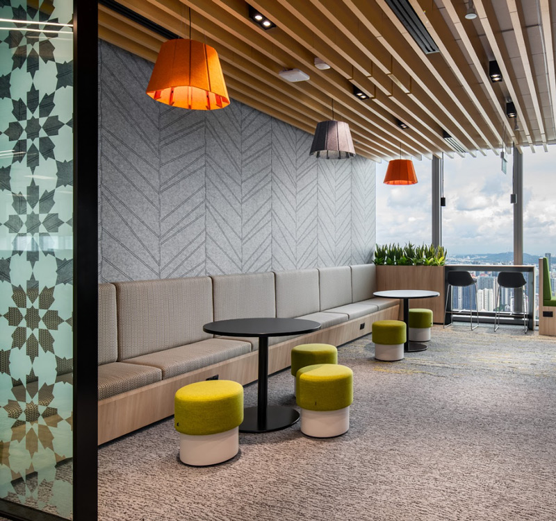 an etched glass dividing wall with a floral pattern