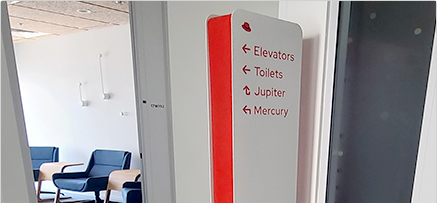 An arrow sign at red hat