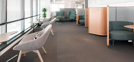 Modern office with comfortable chairs and privacy nooks