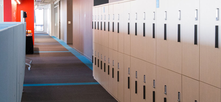 Light wood lockers with individual black number labels