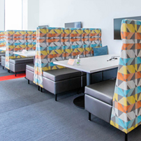 Office hallway with cubby workstations.