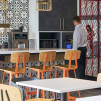 Modern pantry or breakroom with tables