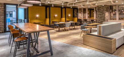 Industrial-style office pantry with wooden furniture