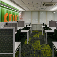 Office cubicles with dark partitions and a colorful accent wall